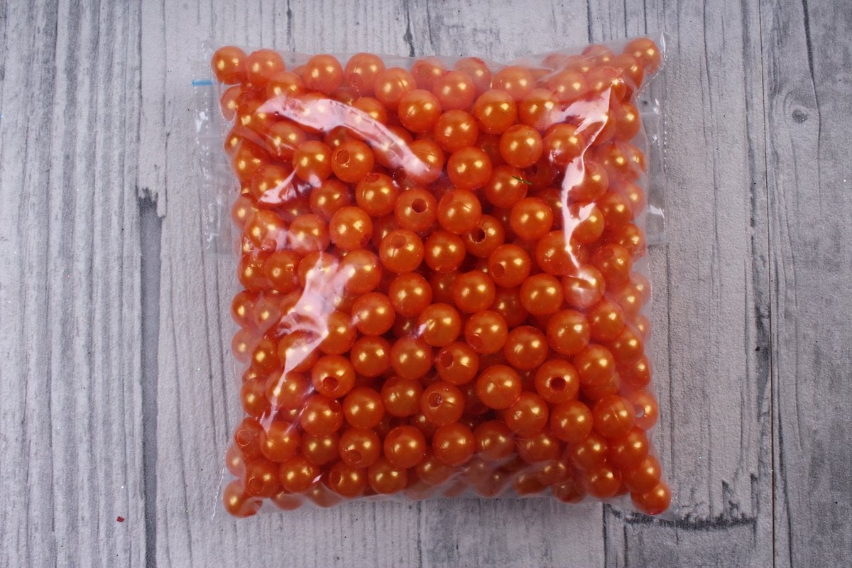 Бусины (С) перламутровые оранжевые (8мм) в пакете 100гр